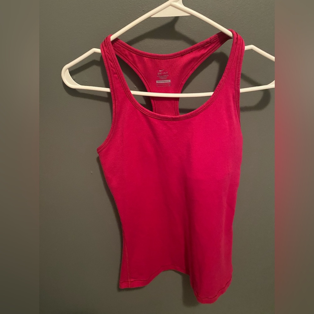 Pink Nike fitted tank.